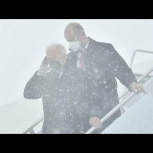 Biden Arrives At Joint Base Andrews Amidst Heavy Snowstorm