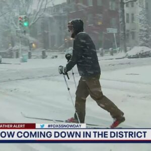 Bob Barnard spots man cross-country skiing through the DC snow during weather report | FOX 5 DC