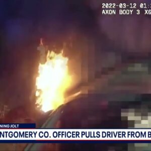 Video shows Montgomery County police officers rescuing driver from burning vehicle | FOX 5 DC