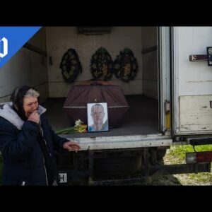 After month-long search, a Ukrainian family buries their son