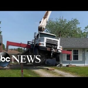 Crane falls through roof of Indiana home