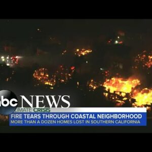 Fire tears through coastal neighborhood