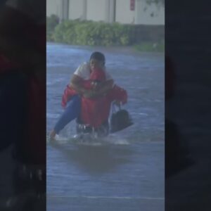 Reporter RESCUES Woman Stuck in HURRICANE IAN’S Floodwaters