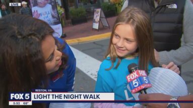 10-year-old who survived cancer attends 'Light the Night' walk