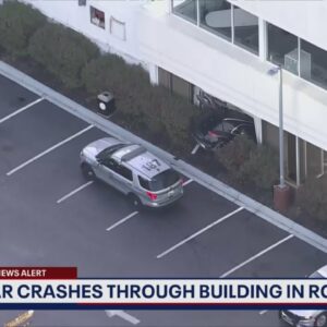 Vehicle crashes into Rockville building; no injuries reported